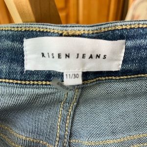 Risen brand capri jeans with distressing.
